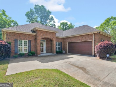 This gorgeous 3 bedroom/2.5 bathroom brick home is located on on Canongate At Georgia National Golf Club in Georgia - for sale on GolfHomes.com, golf home, golf lot