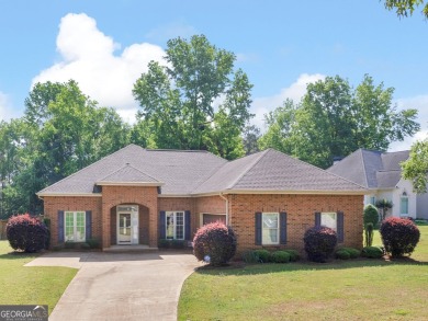 This gorgeous 3 bedroom/2.5 bathroom brick home is located on on Canongate At Georgia National Golf Club in Georgia - for sale on GolfHomes.com, golf home, golf lot
