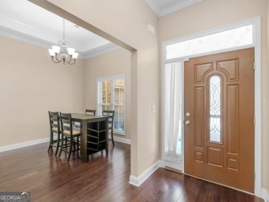 This gorgeous 3 bedroom/2.5 bathroom brick home is located on on Canongate At Georgia National Golf Club in Georgia - for sale on GolfHomes.com, golf home, golf lot