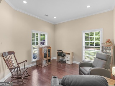 This gorgeous 3 bedroom/2.5 bathroom brick home is located on on Canongate At Georgia National Golf Club in Georgia - for sale on GolfHomes.com, golf home, golf lot
