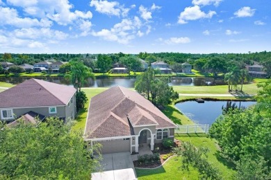 Experience Florida living at its finest in this stunning on Heritage Harbor Golf and Country Club in Florida - for sale on GolfHomes.com, golf home, golf lot