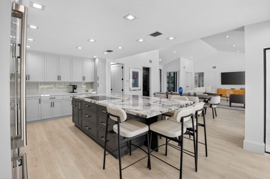 FULLY RENOVATED one-story, 3 bedroom + large den/office home in on St. Andrews Country Club of Boca Raton in Florida - for sale on GolfHomes.com, golf home, golf lot