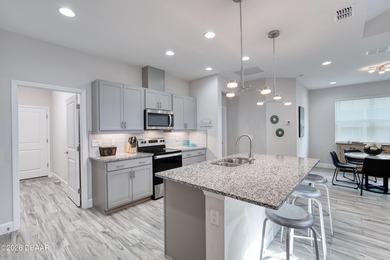 Thoughtfully designed and meticulously maintained, this Camellia on LPGA International Golf Course in Florida - for sale on GolfHomes.com, golf home, golf lot