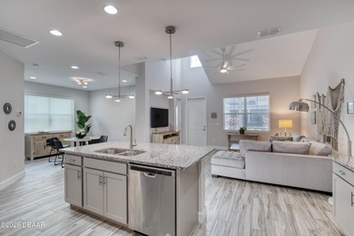 Thoughtfully designed and meticulously maintained, this Camellia on LPGA International Golf Course in Florida - for sale on GolfHomes.com, golf home, golf lot