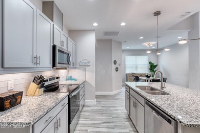 Thoughtfully designed and meticulously maintained, this Camellia on LPGA International Golf Course in Florida - for sale on GolfHomes.com, golf home, golf lot