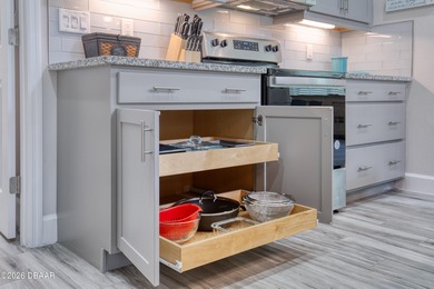 Thoughtfully designed and meticulously maintained, this Camellia on LPGA International Golf Course in Florida - for sale on GolfHomes.com, golf home, golf lot