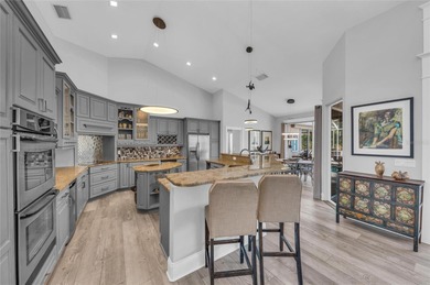 SARASOTA FL: Private Oak Ford retreat on 2 acres with pond, pool on Oak Ford Golf Club in Florida - for sale on GolfHomes.com, golf home, golf lot