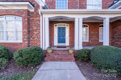 Welcome to this elegant brick home in a prime Tega Cay location on Tega Cay Golf Club in South Carolina - for sale on GolfHomes.com, golf home, golf lot