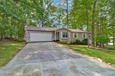 Enjoy lake views of St. George from this beautifully updated 1 on Druid Hills Golf Club in Tennessee - for sale on GolfHomes.com, golf home, golf lot