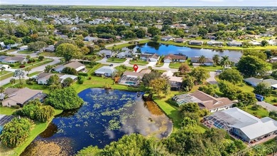 Welcome to this Naples POOL HOME retreat with incredible WATER on Lakewood Country Club in Florida - for sale on GolfHomes.com, golf home, golf lot