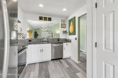 Peaceful water to preserve views from this one-story on Slammer and Squire Golf Course in Florida - for sale on GolfHomes.com, golf home, golf lot