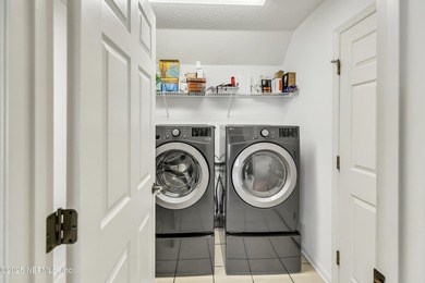 Peaceful water to preserve views from this one-story on Slammer and Squire Golf Course in Florida - for sale on GolfHomes.com, golf home, golf lot