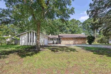 Welcome to your dream home at 103 Wofford Lane in the charming on The Hackler Course at Coastal Carolina University in South Carolina - for sale on GolfHomes.com, golf home, golf lot