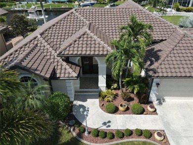 Welcome to Punta Gorda and this amazing home in the golf course on Twin Isles Country Club in Florida - for sale on GolfHomes.com, golf home, golf lot