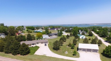 Custom Lake McConaughy Retreat Discover your dream lake getaway on Bayside Golf Course in Nebraska - for sale on GolfHomes.com, golf home, golf lot