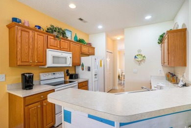 A very well maintained 3 bedroom 2 1/2  bathroom townhouse with on Barefoot Resort and Golf Club  in South Carolina - for sale on GolfHomes.com, golf home, golf lot