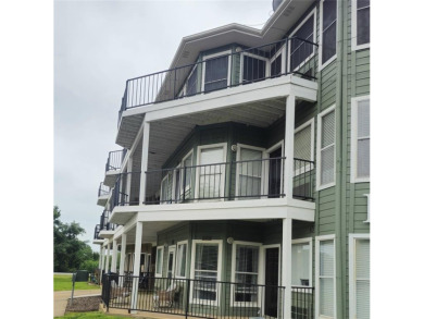 2 bedroom condo with vinyl plank floors. Open floor plan on Tanglewood Resort in Texas - for sale on GolfHomes.com, golf home, golf lot