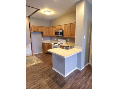 2 bedroom condo with vinyl plank floors. Open floor plan on Tanglewood Resort in Texas - for sale on GolfHomes.com, golf home, golf lot