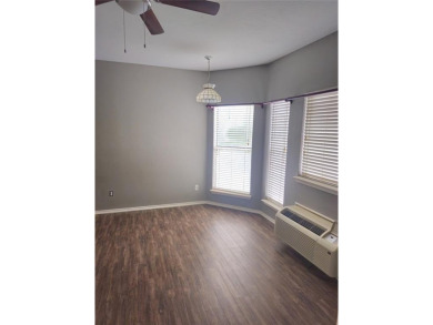 2 bedroom condo with vinyl plank floors. Open floor plan on Tanglewood Resort in Texas - for sale on GolfHomes.com, golf home, golf lot