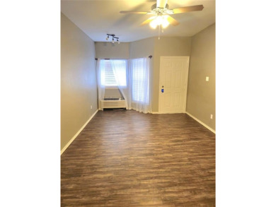 2 bedroom condo with vinyl plank floors. Open floor plan on Tanglewood Resort in Texas - for sale on GolfHomes.com, golf home, golf lot