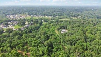 +/- 5 acres of prime land in the rapidly growing community of on Big Sugar Golf Club in Arkansas - for sale on GolfHomes.com, golf home, golf lot