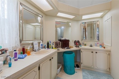 Enjoy living the Naples lifestyle in this light and bright well on Riviera Golf Club in Florida - for sale on GolfHomes.com, golf home, golf lot