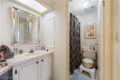 Enjoy living the Naples lifestyle in this light and bright well on Riviera Golf Club in Florida - for sale on GolfHomes.com, golf home, golf lot