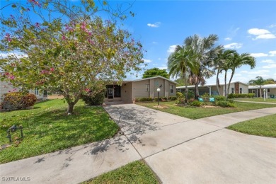 Enjoy living the Naples lifestyle in this light and bright well on Riviera Golf Club in Florida - for sale on GolfHomes.com, golf home, golf lot