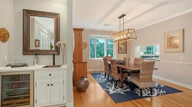 This stunning three-bedroom, 3.5 bath home, designed by the on The Oaks Club in Florida - for sale on GolfHomes.com, golf home, golf lot