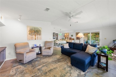 Enjoy living the Naples lifestyle in this light and bright well on Riviera Golf Club in Florida - for sale on GolfHomes.com, golf home, golf lot