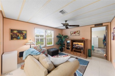 Enjoy living the Naples lifestyle in this light and bright well on Riviera Golf Club in Florida - for sale on GolfHomes.com, golf home, golf lot
