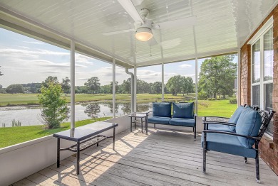 This inviting brick ranch home is tucked away in a quiet gated on Players Course At Wyboo Plantation in South Carolina - for sale on GolfHomes.com, golf home, golf lot