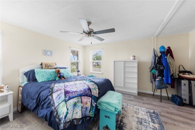 Enjoy living the Naples lifestyle in this light and bright well on Riviera Golf Club in Florida - for sale on GolfHomes.com, golf home, golf lot