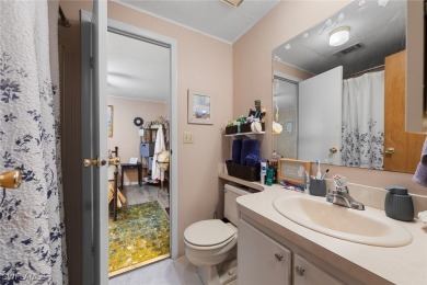 Enjoy living the Naples lifestyle in this light and bright well on Riviera Golf Club in Florida - for sale on GolfHomes.com, golf home, golf lot