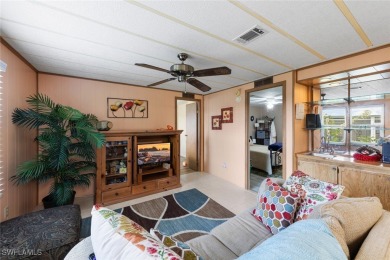 Enjoy living the Naples lifestyle in this light and bright well on Riviera Golf Club in Florida - for sale on GolfHomes.com, golf home, golf lot