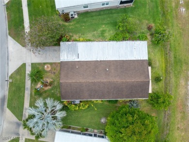 Enjoy living the Naples lifestyle in this light and bright well on Riviera Golf Club in Florida - for sale on GolfHomes.com, golf home, golf lot