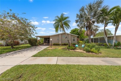 Enjoy living the Naples lifestyle in this light and bright well on Riviera Golf Club in Florida - for sale on GolfHomes.com, golf home, golf lot