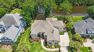 Stunning one-of-a-kind custom stone beauty with pond/golf course on Ocean Ridge Plantation in North Carolina - for sale on GolfHomes.com, golf home, golf lot