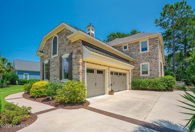 Stunning one-of-a-kind custom stone beauty with pond/golf course on Ocean Ridge Plantation in North Carolina - for sale on GolfHomes.com, golf home, golf lot