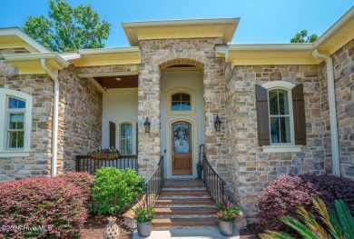Incredible attention to detail in this custom stone beauty on Ocean Ridge Plantation in North Carolina - for sale on GolfHomes.com, golf home, golf lot