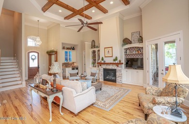 Stunning one-of-a-kind custom stone beauty with pond/golf course on Ocean Ridge Plantation in North Carolina - for sale on GolfHomes.com, golf home, golf lot