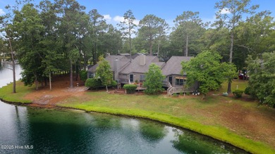 Live lakeside with water views from the kitchen, living area on Harbour Point Golf Club in North Carolina - for sale on GolfHomes.com, golf home, golf lot