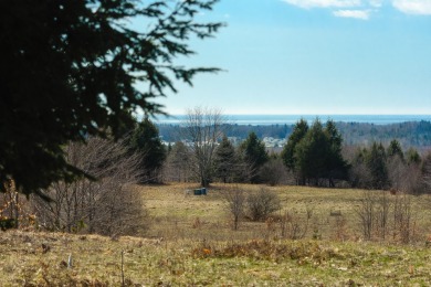 With huge views of Lake Michigan and Portage Lake, this approx on The Heathlands in Michigan - for sale on GolfHomes.com, golf home, golf lot