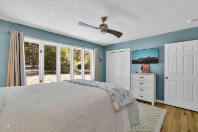 Discover this adorable 3-bedroom, 2-bath cottage tucked away on on Carolina Trace Country Club in North Carolina - for sale on GolfHomes.com, golf home, golf lot