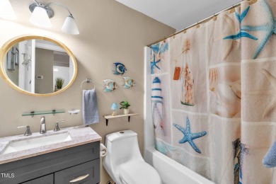 Discover this adorable 3-bedroom, 2-bath cottage tucked away on on Carolina Trace Country Club in North Carolina - for sale on GolfHomes.com, golf home, golf lot