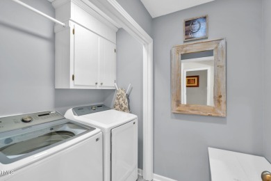 Discover this adorable 3-bedroom, 2-bath cottage tucked away on on Carolina Trace Country Club in North Carolina - for sale on GolfHomes.com, golf home, golf lot