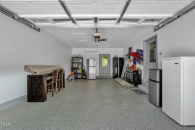 Discover this adorable 3-bedroom, 2-bath cottage tucked away on on Carolina Trace Country Club in North Carolina - for sale on GolfHomes.com, golf home, golf lot