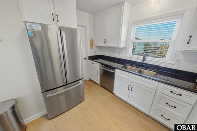 Whether your perfect day includes sandy toes at the beach or on The Currituck Golf Club in North Carolina - for sale on GolfHomes.com, golf home, golf lot