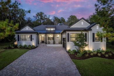 Gorgeous, custom home located in the exclusive gated community on Southern Hills Plantation Club in Florida - for sale on GolfHomes.com, golf home, golf lot