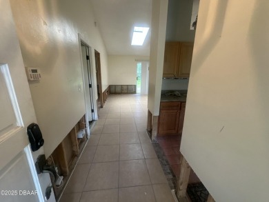 Are you an investor or homebuyer looking for a project? This on Daytona Beach Golf Club in Florida - for sale on GolfHomes.com, golf home, golf lot